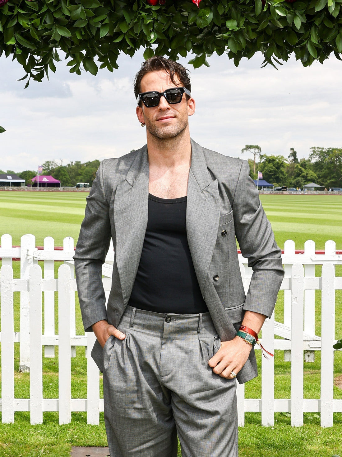 Fool Me Once star Dino Fetscher wore Heron's Ghyll double-breasted grey suit to Queen's Cup Polo 2025