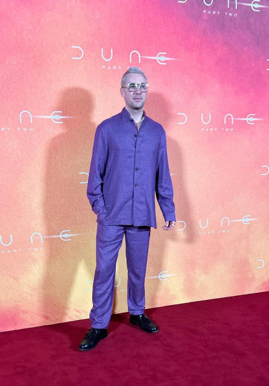 Film director Jamie Neale attends the Dune: Part 2 London premiere in Leicester Square wearing a Heron's Ghyll suit.