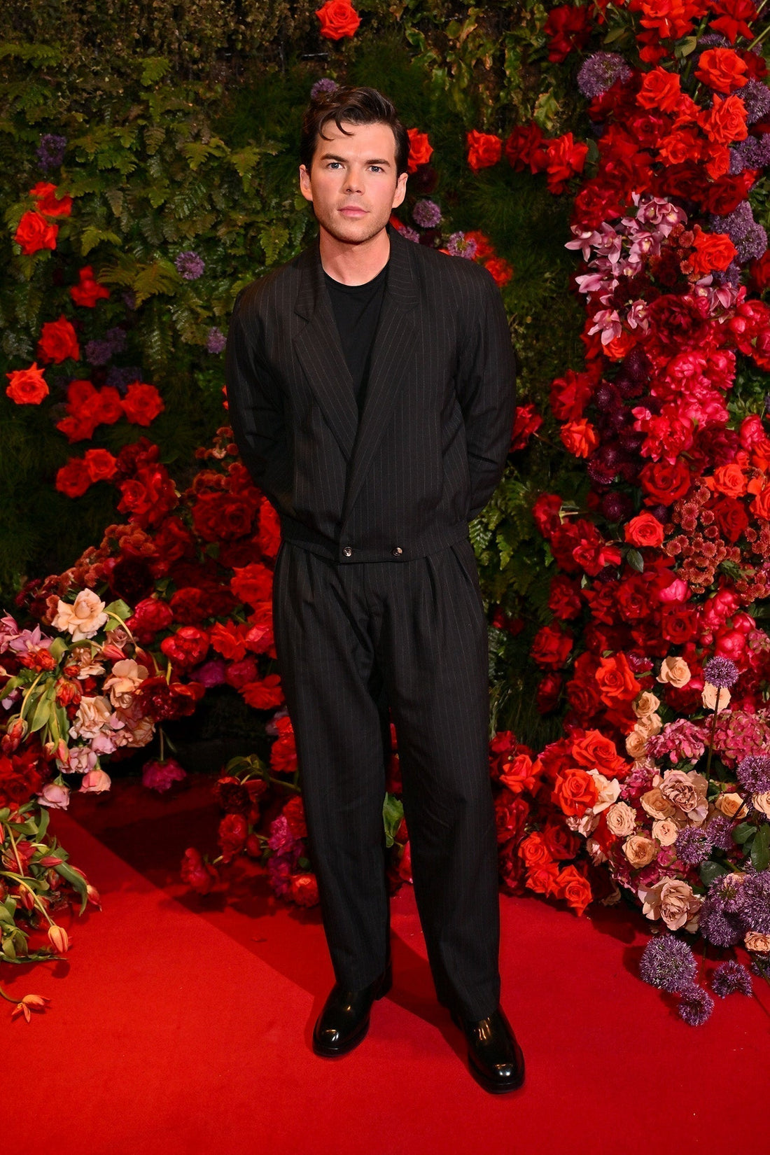 Actor Luke Newton wearing Heron's Ghyll pinstriped Rico suit at the BAFTAs 2025