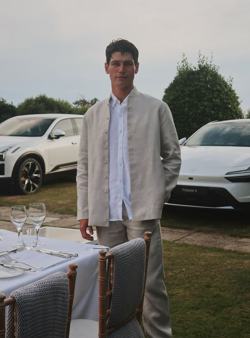 Sam Way attends the Gentleman’s Journal x Polestar event at the 2024 Goodwood Festival of Speed wearing a Heron's Ghyll linen suit.